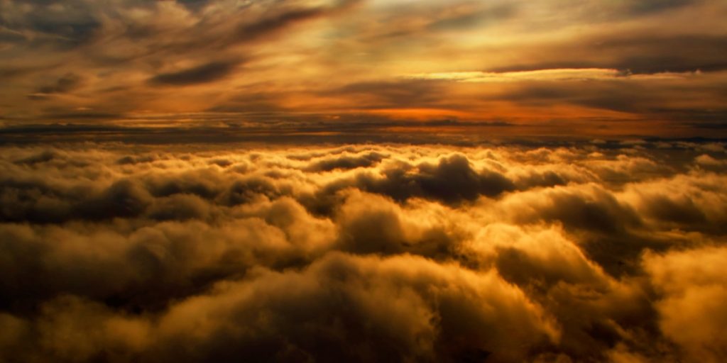 spiritual ascension of flying in the sky above the clouds