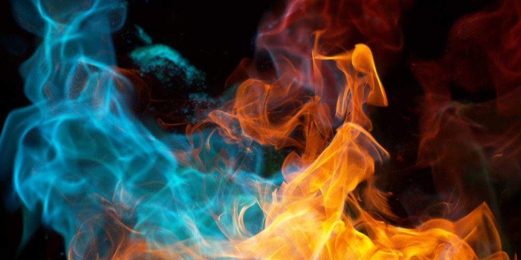 twin flame, blue and red flame burning next to eachother